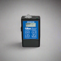 Gilian 800i personal air sampling pump, featuring a robust, compact design with an intrinsically safe build for hazardous environments, including a digital display, control buttons, and attachment clip.